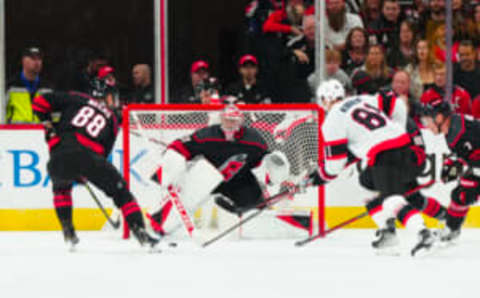 Carolina Hurricanes goaltender Frederik Andersen (31) center Martin Necas (88) and Ottawa Senators left wing Dominik Kubalik (81) watch the puck during the first period at PNC Arena. Mandatory Credit: James Guillory-USA TODAY Sports