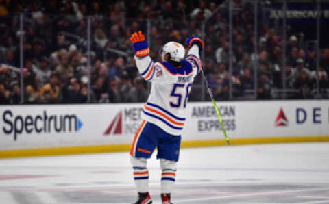 Apr 29, 2023; Los Angeles, California, USA; Edmonton Oilers right wing Kailer Yamamoto (56) celebrates his goal scored against the Los Angeles Kings during the third period in game six of the first round of the 2023 Stanley Cup Playoffs at Crypto.com Arena. Mandatory Credit: Gary A. Vasquez-USA TODAY Sports