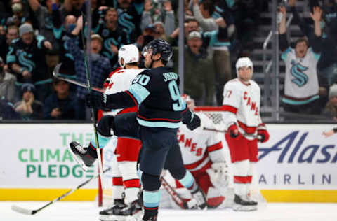 SEATTLE, WASHINGTON – NOVEMBER 24: Marcus Johansson #90 of the Seattle Kraken celebrates his game-winning goal against the Carolina Hurricanes during the third period at Climate Pledge Arena on November 24, 2021, in Seattle, Washington. (Photo by Steph Chambers/Getty Images)