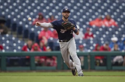 PHILADELPHIA, PA – JUNE 10: Travis Shaw #21 of the Milwaukee Brewers throws the ball to first base against the Philadelphia Phillies at Citizens Bank Park on June 10, 2018 in Philadelphia, Pennsylvania. (Photo by Mitchell Leff/Getty Images)