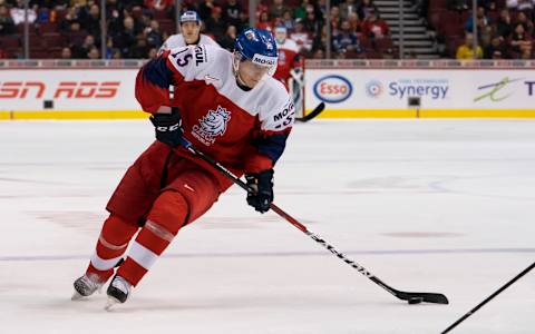 VANCOUVER, BC – DECEMBER 26: Jakub Lauko #15 of the Czech Republic skates with the puck in Group A hockey action against Switzerland at the 2019 IIHF World Junior Championship action on December, 26, 2018 at Rogers Arena in Vancouver, British Columbia, Canada. (Photo by Rich Lam/Getty Images)