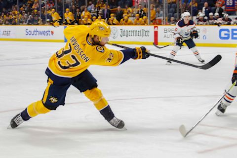 NASHVILLE, TENNESSEE – MARCH 02: Viktor Arvidsson #33 of the Nashville Predators takes a shot against the Edmonton Oilers during the third period at Bridgestone Arena on March 02, 2020 in Nashville, Tennessee. (Photo by Frederick Breedon/Getty Images)