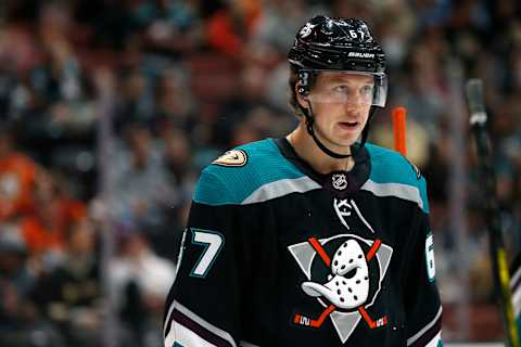 ANAHEIM, CALIFORNIA – MARCH 10: Rickard Rakell #67 of the Anaheim Ducks looks on between plays during a game against the Los Angeles Kings at Honda Center on March 10, 2019 in Anaheim, California. (Photo by Katharine Lotze/Getty Images)