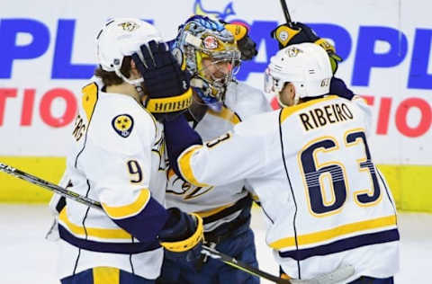 NHL Power Rankings: Nashville Predators goalie Pekka Rinne (35) celebrates with left wing Filip Forsberg (9) and center Mike Ribeiro (63) after defeating the Philadelphia Flyers in a shootout at Wells Fargo Center. The Predators won 2-1 in a shootout. Mandatory Credit: Eric Hartline-USA TODAY Sports