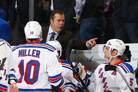 NEW YORK, NY – DECEMBER 02: Alain Vigneault of the New York Rangers talks to Dan Girardi