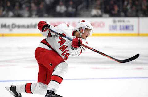 LOS ANGELES, CALIFORNIA – OCTOBER 15: Sebastian Aho #20 of the Carolina Hurricanes watches his shot from the point during a 2-0 Hurricanes win over the Los Angeles Kings at Staples Center on October 15, 2019 in Los Angeles, California. (Photo by Harry How/Getty Images)