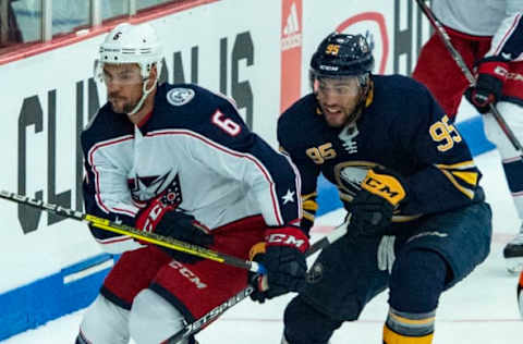 CLINTON, NY – SEPTEMBER 25: Columbus Blue Jackets Defenseman Adam Clendening (6) and Buffalo Sabers Right Wing Justin Bailey (95) chase after the puck during the first period of the Columbus Blue Jackets versus the Buffalo Sabers preseason game on September 25, 2018, at Clinton Arena in Clinton, New York. (Photo by Gregory Fisher/Icon Sportswire via Getty Images)