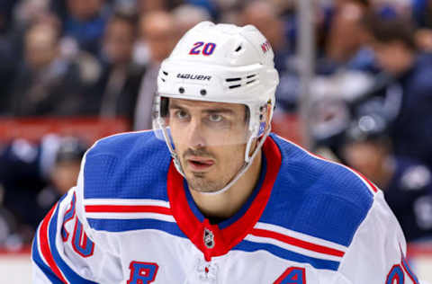 WINNIPEG, MB – FEBRUARY 12: Chris Kreider #20 of the New York Rangers looks on during a third period face-off against the Winnipeg Jets at the Bell MTS Place on February 12, 2019 in Winnipeg, Manitoba, Canada. The Jets defeated the Rangers 4-3. (Photo by Jonathan Kozub/NHLI via Getty Images)