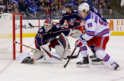 COLUMBUS, OH – JANUARY 13: Sergei Bobrovsky #72 of the Columbus Blue Jackets follows the puck as Vladislav Namestnikov #90 of the New York Rangers looks to gain control of the loose puck during the game on January 13, 2019 at Nationwide Arena in Columbus, Ohio. (Photo by Kirk Irwin/Getty Images)