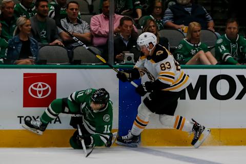 DALLAS, TX – OCTOBER 03: Dallas Stars center Andrew Cogliano (11) and Boston Bruins center Karson Kuhlman (83) chase the puck during the game between the Dallas Stars and the Boston Bruins on October 03, 2019 at American Airlines Center in Dallas, Texas. (Photo by Matthew Pearce/Icon Sportswire via Getty Images)