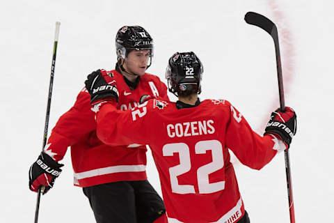 Connor McMichael #17 and Dylan Cozens #22 of Canada. (Photo by Codie McLachlan/Getty Images)