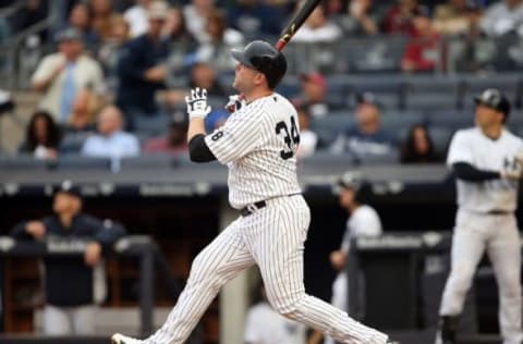 Oct 2, 2016; Bronx, NY, USA; New York Yankees catcher Brian McCann (34) hits a home run in the bottom of the fourth inning against the Baltimore Orioles at Yankee Stadium. It was the 20th home run of the season for McCann. Mandatory Credit: Danny Wild-USA TODAY Sports