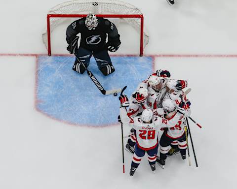 TAMPA, FL – MARCH 30: Alex Ovechkin #8 of the Washington Capitals celebrates his 50th goal of the season with teammates and against goalie Andrei Vasilevskiy #88 of the Tampa Bay Lightning at Amalie Arena on March 30, 2019 in Tampa, Florida. (Photo by Scott Audette/NHLI via Getty Images)