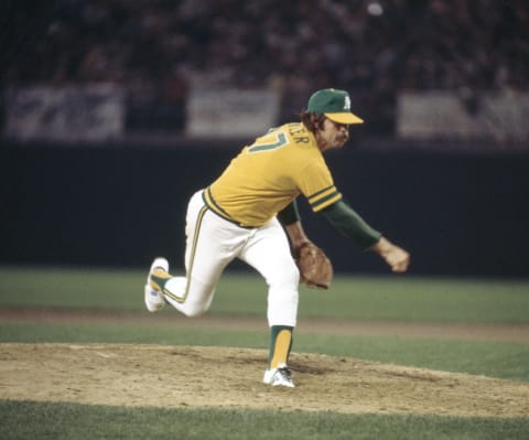 OAKLAND, CA – OCTOBER 15, 1974: Picher Jim “Catfish” Hunter #27 of the Oakland Athletics pitches to the Los Angeles Dodgers during the 1974 World Series at the Oakland-Alameda County Coliseum on October 15, 1974 in Oakland, California. (Photo by Herb Scharfman/Sports Imagery/Getty Images)