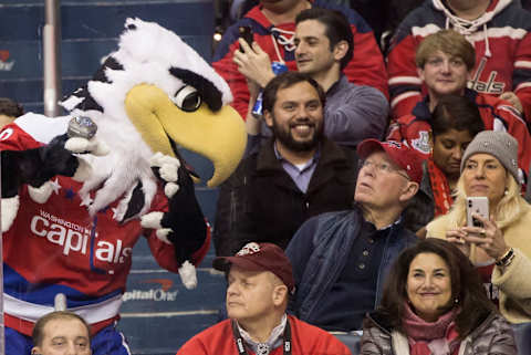 WASHINGTON, DC – DECEMBER 19: Washington Capitals mascot Slapshot interacts with the fans during a NHL game between the Washington Capitals and the Pittsburgh Penguins on December 19, 2018, at Capital One Arena, in Washington, D.C.(Photo by Tony Quinn/Icon Sportswire via Getty Images)