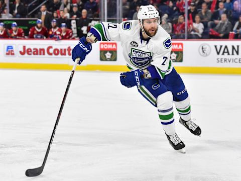 LAVAL, QC – MARCH 09: Jonah Gadjovich #22 of the Utica Comets skates against the Laval Rocket during the AHL game at Place Bell on March 9, 2019 in Laval, Quebec, Canada. The Laval Rocket defeated the The Utica Comets 5-3. (Photo by Minas Panagiotakis/Getty Images)