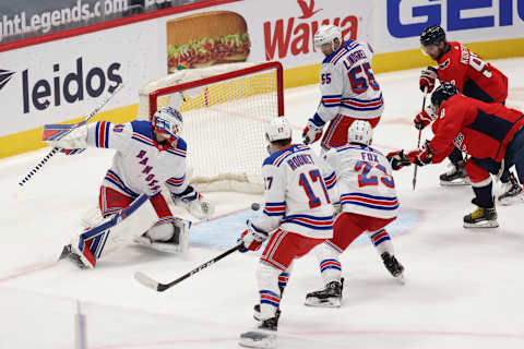 ;Washington Capitals left wing Alex Ovechkin (8) scores a goal on New York Rangers goaltender Alexandar Georgiev (40) Credit: Geoff Burke-USA TODAY Sports