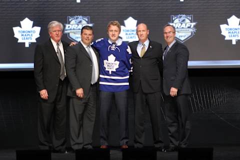 PITTSBURGH, PA – JUNE 22: Morgan Rielly (C), fifth overall pick by the Toronto Maple Leafs  (Photo by Bruce Bennett/Getty Images)