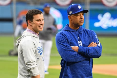 LOS ANGELES, CA – OCTOBER 03: Andrew Frieddman, the President of Baseball Operations of the Los Angeles Dodgers, looks on with manager Dave Robberts during team workouts on October 3, 2018, one day before the 2018 National League Division Series kicks off between the Atlanta Braves and the Los Angeles Dodgers at Dodger Stadium in Los Angeles, CA.