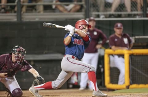 HATTIESBURG, MS – JUNE 02: South Alabama outfielder Travis Swaggerty (21) gets a single during an NCAA Division I Regional baseball game between the South Alabama Jaguars and the Mississippi State Bulldogs on June 02, 2017 at Pete Taylor Park, Hattiesburg, MS. (Photo by Bobby McDuffie/Icon Sportswire via Getty Images)