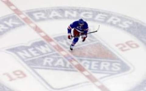 May 22, 2014; New York, NY, USA; New York Rangers left wing Rick Nash skates across the center ice logo before game three of the Eastern Conference Final of the 2014 Stanley Cup Playoffs against the Montreal Canadiens at Madison Square Garden. Mandatory Credit: Ed Mulholland-USA TODAY Sports