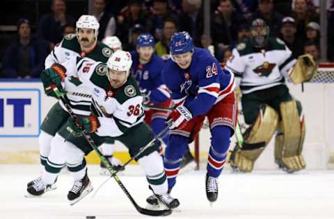 NEW YORK, NEW YORK – JANUARY 10: Mats Zuccarello #36 of the Minnesota Wild and Kaapo Kakko #24 of the New York Rangers battle for the puck during the game at Madison Square Garden on January 10, 2023 in New York City. (Photo by Jamie Squire/Getty Images)