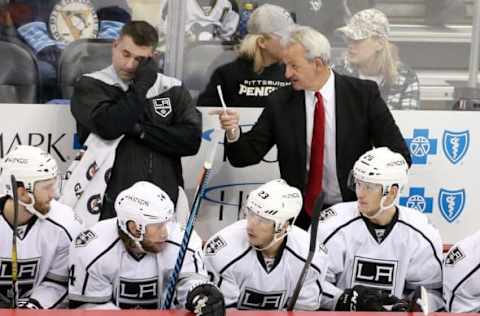 NHL Power Rankings: Los Angeles Kings head coach Darryl Sutter (rear right) gestures on the bench against the Pittsburgh Penguins in overtime at the PPG PAINTS Arena. The Kings won 1-0 in overtime. Mandatory Credit: Charles LeClaire-USA TODAY Sports