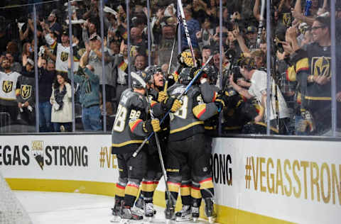 LAS VEGAS, NV – OCTOBER 10: (L-R) Nate Schmidt #88, Luca Sbisa #47, William Carrier #28, and Tomas Nosek #92 of the Vegas Golden Knights celebrate after scoring a goal during their inaugural regular-season home opener against the Arizona Coyotes at T-Mobile Arena on October 10, 2017 in Las Vegas, Nevada. (Photo by Jeff Bottari/NHLI via Getty Images)