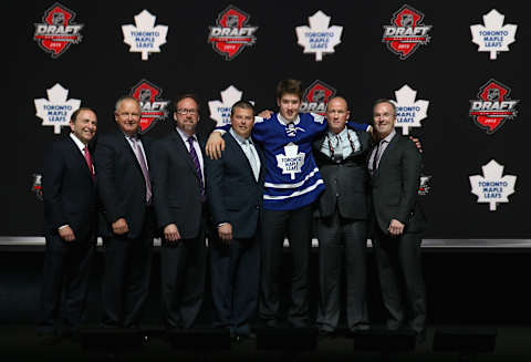 NEWARK, NJ – JUNE 30: Frederik Gauthier poses with the front office after being selected number twenty one overall in the first round by the Toronto Maple Leafs. (Photo by Bruce Bennett/Getty Images)