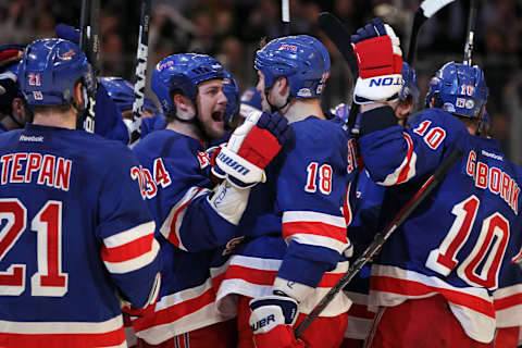 Marc Staal #18 of the New York Rangers celebrates with his teammate John Mitchell #34 after scoring the winning goal in overtime (Photo by Bruce Bennett/Getty Images)