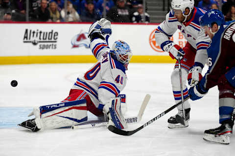 Dec 14, 2021; Denver, Colorado, USA; Colorado Avalanche right wing Mikko Rantanen (96) shoots the puck at New York Rangers goaltender Alexandar Georgiev (40) as defenseman K’Andre Miller (79) defends in the second period at Ball Arena. Mandatory Credit: Ron Chenoy-USA TODAY Sports