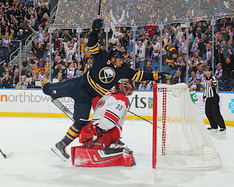 BUFFALO, NY – NOVEMBER 18: Evander Kane #9 of the Buffalo Sabres celebrates his third period goal against Scott Darling #33 of the Carolina Hurricanes during an NHL game on November 18, 2017 at KeyBank Center in Buffalo, New York. Carolina won, 3-1. (Photo by Bill Wippert/NHLI via Getty Images)