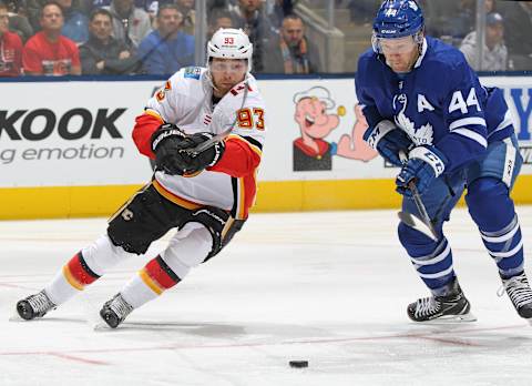 TORONTO, ON – OCTOBER 29: Sam Bennett #93 of the Calgary Flames skates against Morgan Rielly #44 of the Toronto Maple Leafs . (Photo by Claus Andersen/Getty Images)