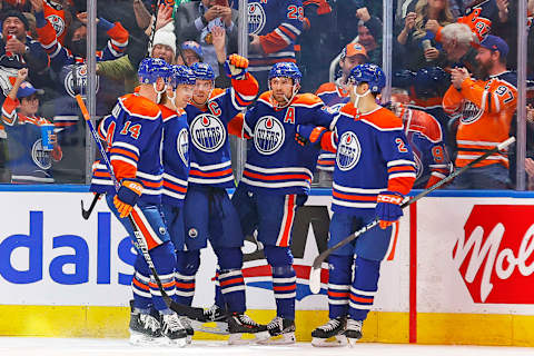 Nov 15, 2023; Edmonton, Alberta, CAN; The Edmonton Oilers celebrate a goal scored by forward Connor McDavid (97) during the second period against the Seattle Kraken at Rogers Place. Mandatory Credit: Perry Nelson-USA TODAY Sports