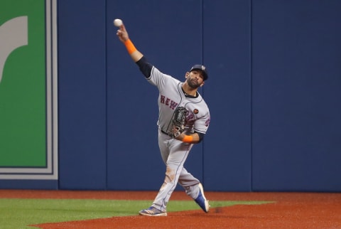 Jose Bautista had one of the best arms among right fielders. (Photo by Tom Szczerbowski/Getty Images)