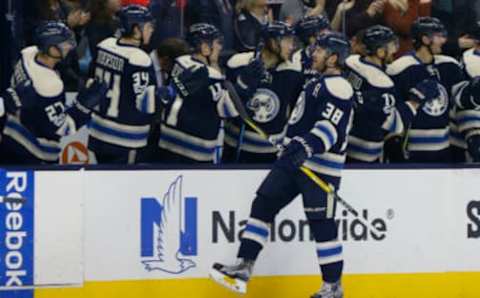 Feb 11, 2017; Columbus, OH, USA; Columbus Blue Jackets center Boone Jenner (38) celebrates with teammates on the bench after scoring a goal against the Detroit Red Wings during the first period at Nationwide Arena. Mandatory Credit: Russell LaBounty-USA TODAY Sports