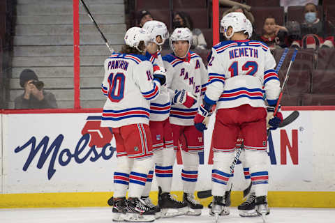 Feb 20, 2022; Ottawa, Ontario, CAN; The New York Rangers celebrate a goal scored by center Ryan Strome (16) in the first period against the Ottawa Senators at the Canadian Tire Centre. Mandatory Credit: Marc DesRosiers-USA TODAY Sports