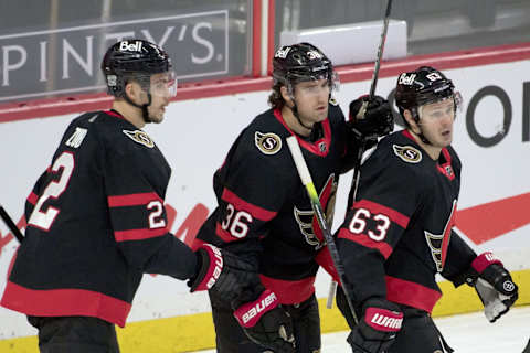 The Ottawa Senators celebrate after a goal by center Colin White (36). Mandatory Credit: Marc DesRosiers-USA TODAY Sports