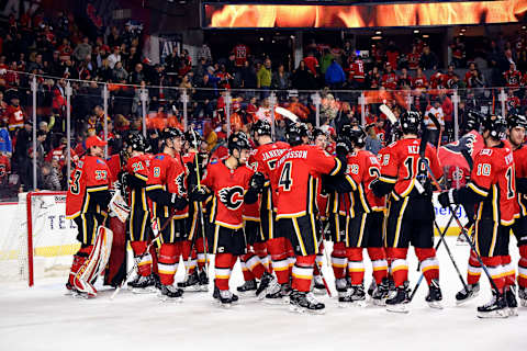 CALGARY, AB – NOVEMBER 01: The Calgary Flames celebrate a 6-5 win over the Colorado Avalanche following an NHL game on November 01, 2018, at the Scotiabank Saddledome, Calgary, AB. (Photo by Brett Holmes/Icon Sportswire via Getty Images)