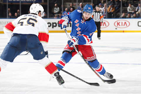 NEW YORK, NY – NOVEMBER 20: Mats Zuccarello #36 of the New York Rangers shoots the puck against Jason Demers #55 of the Florida Panthers at Madison Square Garden on November 20, 2016 in New York City. (Photo by Jared Silber/NHLI via Getty Images)