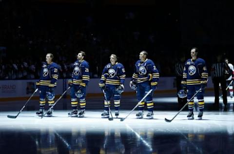 Sep 27, 2016; Buffalo, NY, USA; Buffalo Sabres defenseman Jake McCabe (29), center Zemgus Girgensons (28), left wing Tyler Ennis (63), right wing Kyle Okposo (21) and defenseman Erik Burgdoerfer (46) stand for the national anthem before the game against the Ottawa Senators at KeyBank Center. Mandatory Credit: Kevin Hoffman-USA TODAY Sports