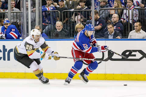 NEW YORK, NY – OCTOBER 31: New York Rangers Defenseman Kevin Shattenkirk (22) tracks puck as Vegas Golden Knights Left Wing William Carrier (28) defends during the Vegas Golden Knights and New York Rangers NHL game on October 31, 2017, at Madison Square Garden in New York, NY. (Photo by John Crouch/Icon Sportswire via Getty Images)