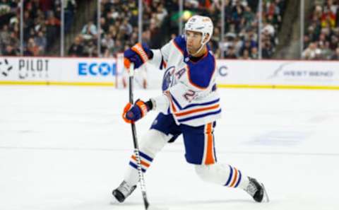 ST PAUL, MN – DECEMBER 12: Darnell Nurse #25 of the Edmonton Oilers shoots the puck against the Minnesota Wild in the first period of the game at Xcel Energy Center on December 12, 2022 in St Paul, Minnesota. The Wild defeated the Oilers 2-1. (Photo by David Berding/Getty Images)