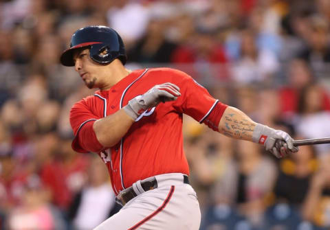 Sep 24, 2016; Pittsburgh, PA, USA; Washington Nationals catcher Wilson Ramos (40) singles against the Pittsburgh Pirates during the first inning at PNC Park. Mandatory Credit: Charles LeClaire-USA TODAY Sports