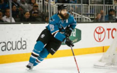 Apr 8, 2017; San Jose, CA, USA; San Jose Sharks defenseman Brent Burns (88) controls the puck against the Calgary Flames during the second period at SAP Center at San Jose. Mandatory Credit: Stan Szeto-USA TODAY Sports