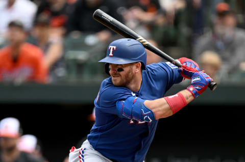 BALTIMORE, MARYLAND – MAY 28: Robbie Grossman #4 of the Texas Rangers bats against the Baltimore Orioles at Oriole Park at Camden Yards on May 28, 2023 in Baltimore, Maryland. (Photo by G Fiume/Getty Images)