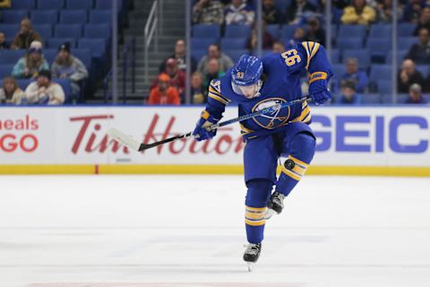 BUFFALO, NEW YORK – SEPTEMBER 27: Matt Savoie #93 of the Buffalo Sabres kicks the puck as he skates during the first period against the Philadelphia Flyers at KeyBank Center on September 27, 2022 in Buffalo, New York. (Photo by Joshua Bessex/Getty Images)