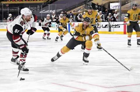 LAS VEGAS, NEVADA – JANUARY 20: Phil Kessel #81 of the Arizona Coyotes shoots against Alex Pietrangelo #7 of the Vegas Golden Knights in the third period of their game at T-Mobile Arena on January 20, 2021 in Las Vegas, Nevada. The Golden Knights defeated the Coyotes 5-2. (Photo by Ethan Miller/Getty Images)