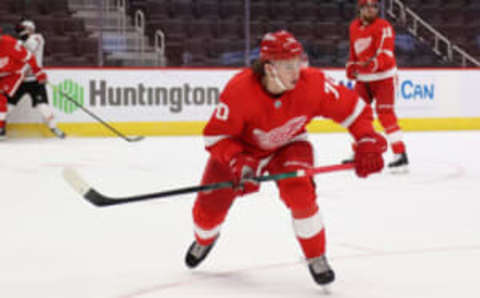 DETROIT, MICHIGAN – FEBRUARY 17: Troy Stecher #70 of the Detroit Red Wings skates against the Chicago Blackhawks at Little Caesars Arena on February 17, 2021 in Detroit, Michigan. (Photo by Gregory Shamus/Getty Images)