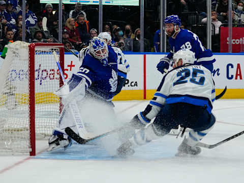 Mar 31, 2022; Toronto, Ontario, CAN; Toronto Maple Leafs goaltender Erik Kallgren (50) makes a save on Winnipeg Jets forward Paul Stastny (25) during the second period at Scotiabank Arena. Mandatory Credit: John E. Sokolowski-USA TODAY Sports